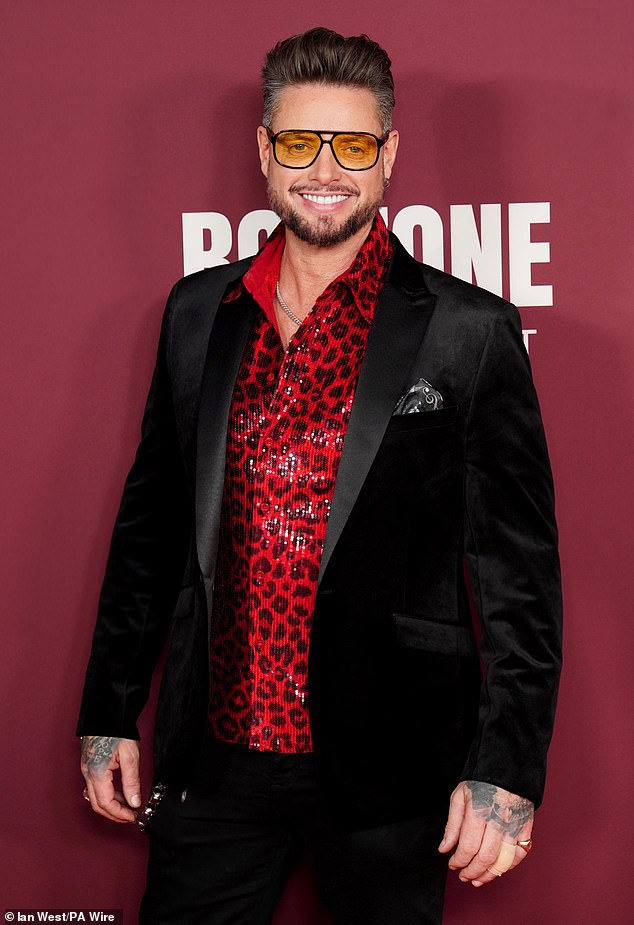 Keith finished his bold look with a tuxedo jacket, a skull pendant necklace and a pair of orange-tinted aviator shades