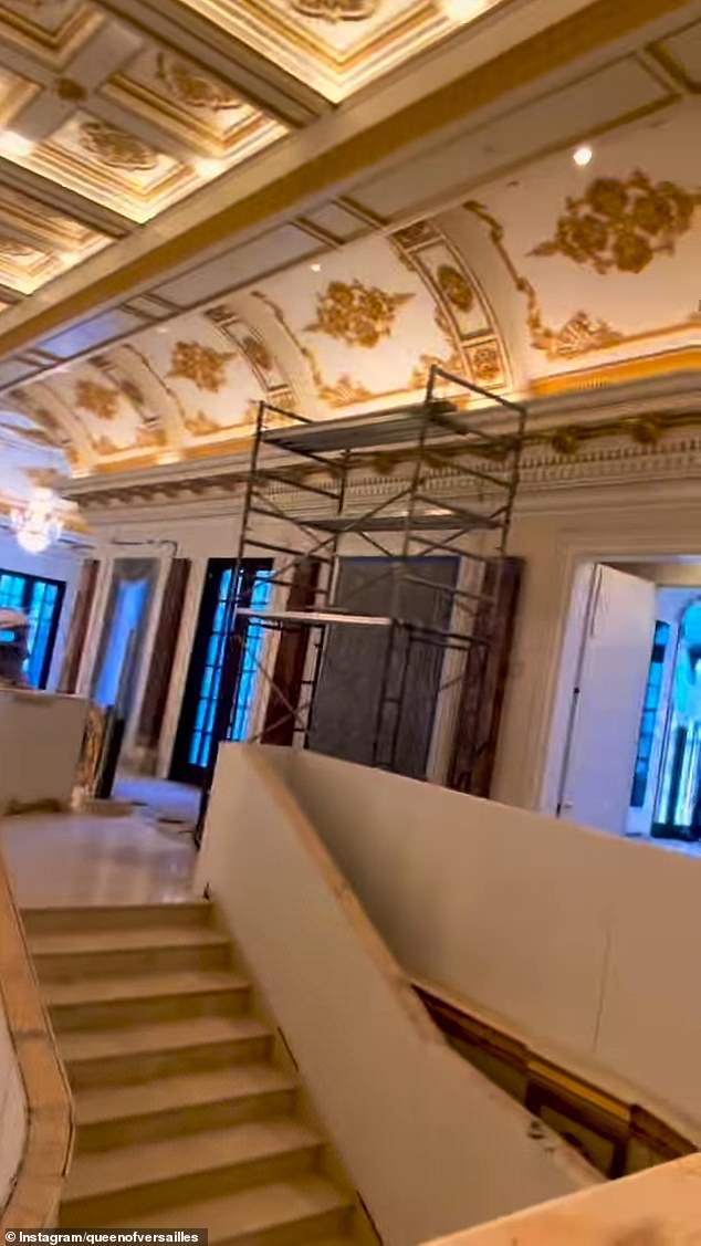 She panned to reveal the railing of the marble staircase was still being built, and more scaffolding for the ceiling moulding was set up