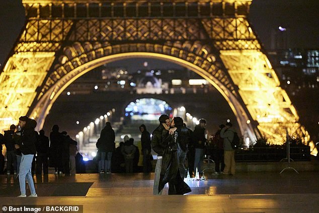 Grammy award-winner Dua kisses Turner after they enjoyed dinner at a restaurant in the city's Marais district