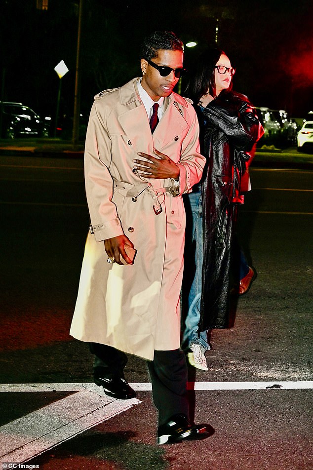 The Praise the Lord hitmaker opted for a trench coat over the smart ensemble and wore a pair of sunglasses