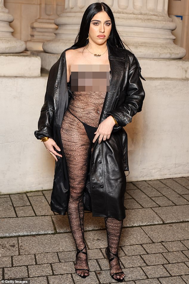 Madonna's daughter Lourdes Leon left nothing to the imagination in a lace castuit that revealed her bare breasts