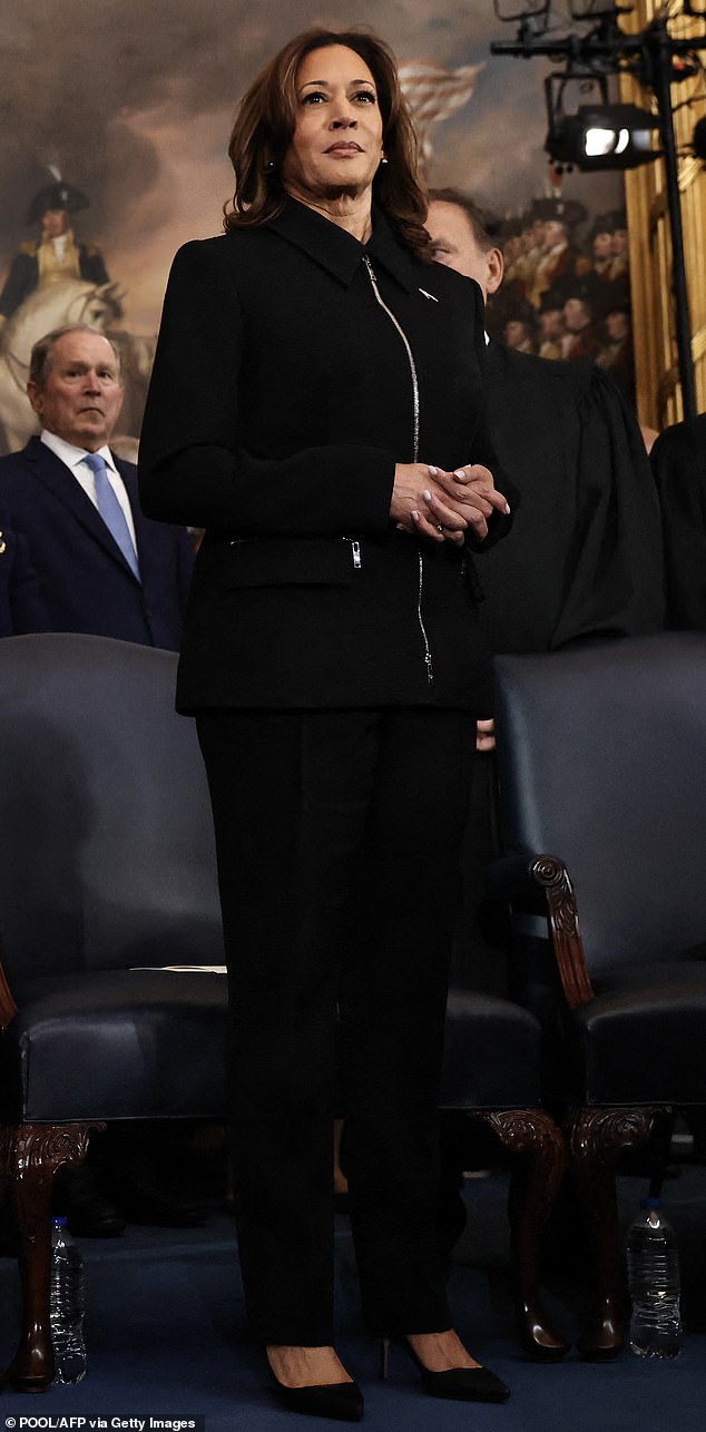 Kamala Harris (pictured at the inauguration) sat front and center – a bleak vision of a female empowerment in a black tailored zipper jacket that betrayed not an inch of skin.