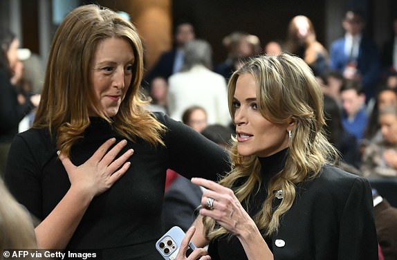 US media personality Megyn Kelly (R) looks on before US Secretary of Health and Human Services nominee Robert F. Kennedy Jr. arrives to testify during a Senate Finance Committee hearing on his nomination to be Health and Human Services Secretary, on Capitol Hill in Washington, DC, January 29, 2025. (Photo by ANDREW CABALLERO-REYNOLDS / AFP) (Photo by ANDREW CABALLERO-REYNOLDS/AFP via Getty Images)