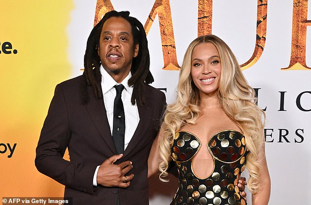 Jay-Z, pictured last month with wife Beyoncé, has denied all of the claims against him