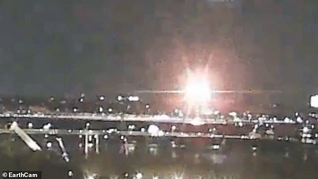 Video from an observation camera at the nearby Kennedy Center shows two sets of lights consistent with aircraft appearing to conjoin in a fireball