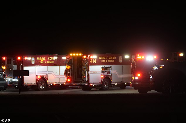 Emergency equipment stages at Gravelly Point, north of Ronald Reagan Washington National Airport, along the Potomac River, Wednesday, Jan. 29, 2025