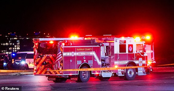 Emergency services operate at Gravelly Point, after American Eagle flight 5342 collided with a helicopter while approaching Reagan Washington National Airport and crashed in the Potomac River, in Arlington, Virginia, U.S. January 29, 2025. REUTERS/Elizabeth Frantz