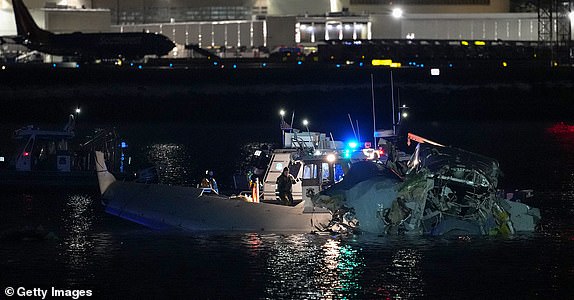 ARLINGTON, VIRGINIA - JANUARY 30: Emergency response units assess airplane wreckage in the Potomac River near Ronald Reagan Washington Airport on January 30, 2025 in Arlington, Virginia. An American Airlines flight from Wichita, Kansas collided with a helicopter while approaching Ronald Reagan National Airport. (Photo by Andrew Harnik/Getty Images)