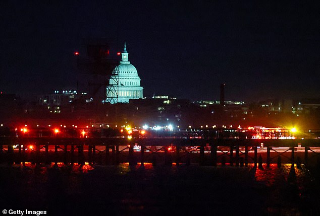 Vast numbers of emergency vehicles were gathered on the east bank of the river, on the Washington D.C. side, their lights illuminating the Capitol building and the Washington Monument