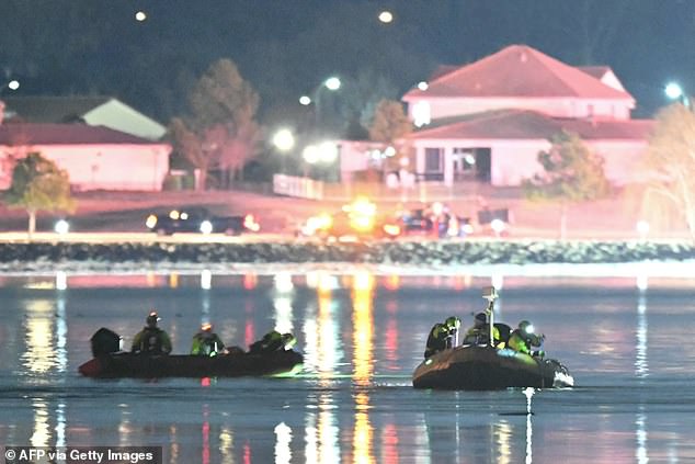 Rescue boats search the waters of the Potomac River for survivors after the deadly plane crash