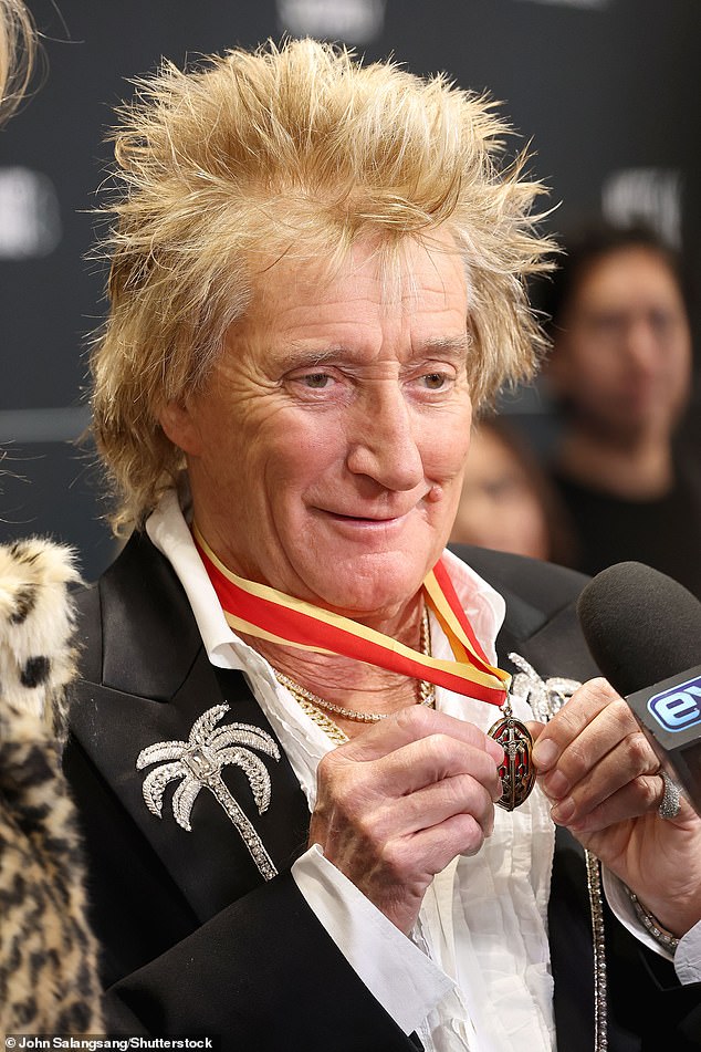 Taking to the red carpet ahead of his perfomance Sir Rod wore the accelerate around his neck and showed it off to everyone