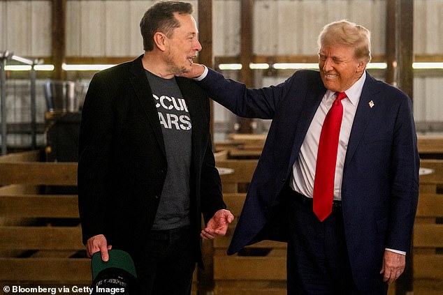 Trump (pictured with Musk in October last year) underscored his support for the tech billionaire, telling reporters on Sunday night he felt the billionaire was 'doing a good job' even if they did not agree on every point