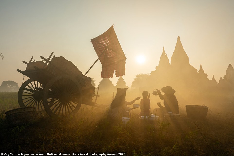 The winner of the Myanmar national award, Zay Yar Lin snaps a 'local farmer and his family having breakfast' in Old Bagan, Myanmar. The family had been working in the paddy fields since the early morning