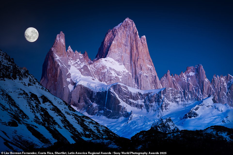 Shortlisted for the Latin America regional awards, Costa Rican photographer Lior Berman Fernandez captured this image in Argentinian Patagonia. The incredible photograph was snapped as 'the first rays of sunlight hit the face of Monte Fitz Roy' and the 'blue moon descends towards the horizon'