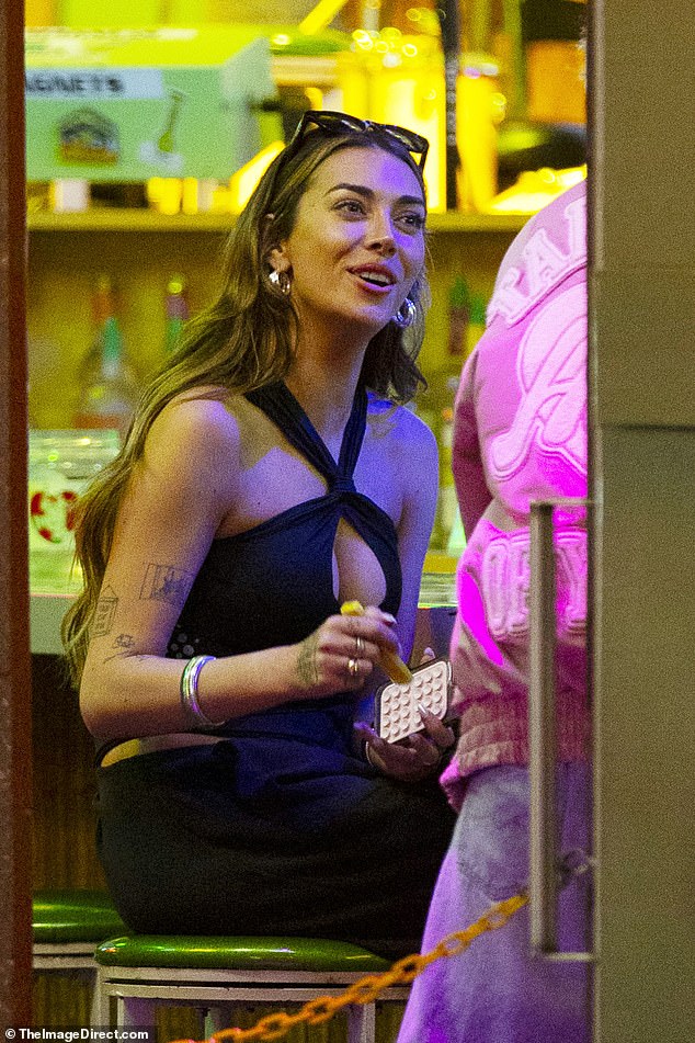 Brianna 'Chickenfry' LaPaglia looked single and ready to mingle in New Orleans on Tuesday night, nearly four months after her shock split with country music star Zach Bryan