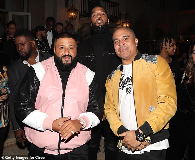 Gotti's style proved to be commercial gold for many artists with crossover appeal in the early 2000s, as he fused radio-friendly melodies with traditional hip-hop beats; pictured in 2017 in Beverly Hills with DJ Khaled (L) and Andre 'Dre' Christopher Lyon (top center)