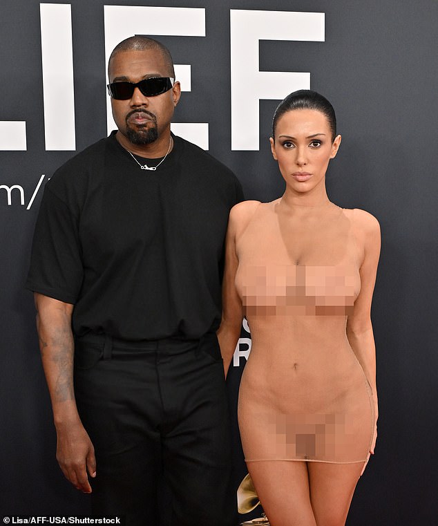 But at Sunday's Grammy Awards, rapper Kanye West showed up uninvited and tried getting a picture with Swift. He also crashed the red carpet with barely-clothed 'wife' Bianca Censori.