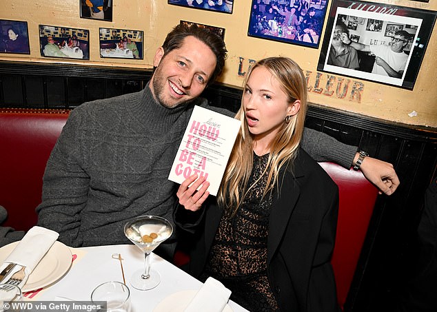 Lila showed off her copy of Tish's new book How To Be A Goth as she attended the celebratory launch dinner