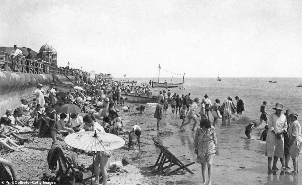 Holidaymakers are pictured here on Bognor Regis beach in the early 1900s. Bognor Regis got its first cinema, a theatre and a roller-skating rink around this time, explains localhistories.org