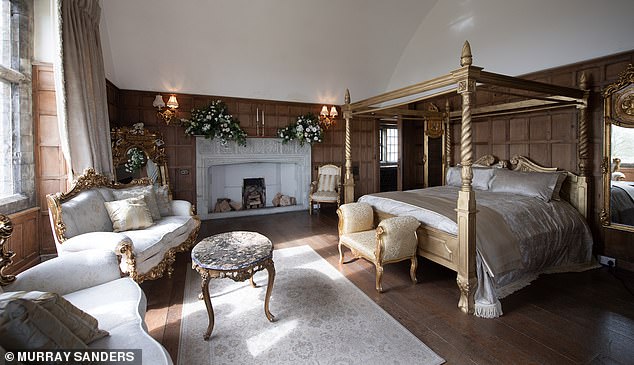 An interior shot of the plush castle's master bedroom - boasting fittings and fixtures fit for a would-be king and queen