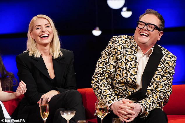 The former This Morning presenter appeared on Friday's Graham Norton Show alongside fellow guest and host Alan Carr, 48 - revealing they once did shots with the legendary physicist at a party