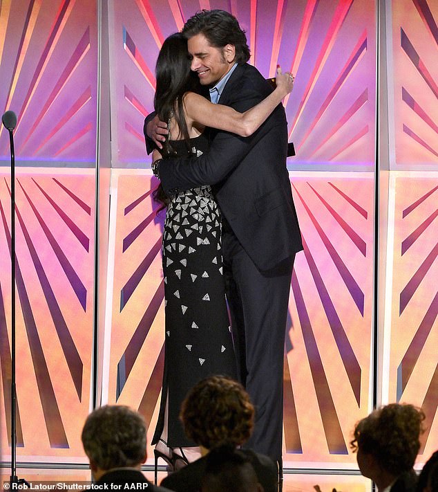 Demi embraced Full House alum Stamos as she stepped onto the stage to accept the Best Actress Award on Saturday