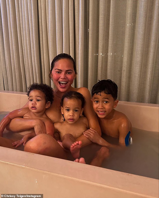 Chrissy Teigen was criticized for sharing a snap of herself taking a bath with her six-year-old son Miles, two-year-old daughter Esti, and 20-month-old son Wren at her $17.5M six-bedroom Beverly Hills mansion on Saturday