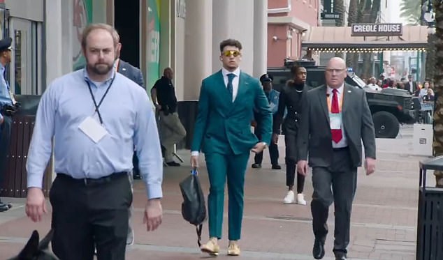 Patrick Mahomes headed to the Super Bowl Sunday in a striking green suit ahead of the game