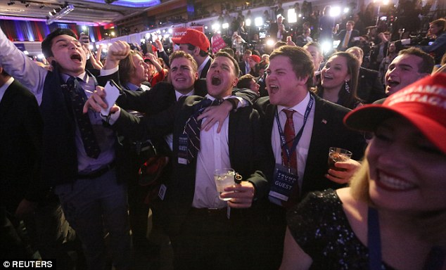 Lonely? Several Trump supporters have complained that online dating has become difficult for them (other supporters pictured on Election night)