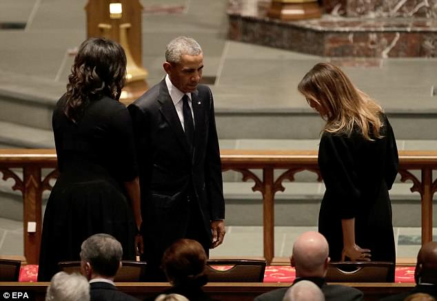 She sat next to Obama and did not appear to have much contact with the Clintons