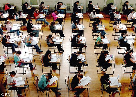 Call for change: Pupils who sit GCSEs at 16 (above) could be better off leaving the national curriculum earlier and choosing either academic or vocational subjects to study until age 18, Miss Morris said