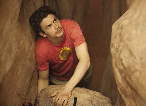 Not for the squeamish: James Franco, gives a brilliant, but harrowing, performance as climber Aron Ralston in 127 Hours