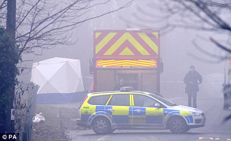 Police at the scene where the frozen body of the architect was discovered on Christmas Day