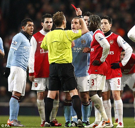 Early bath: Referee Mike Jones dismissed Zabaleta and Sagna