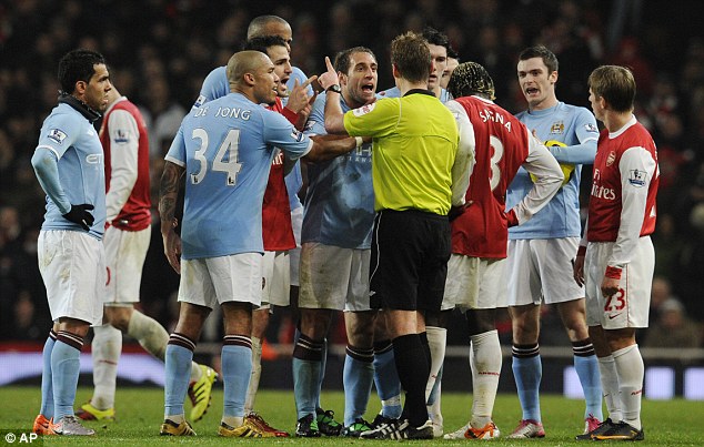 Seeing red: Zabaleta and Sagna were both sent off in the closing stages of the stalemate