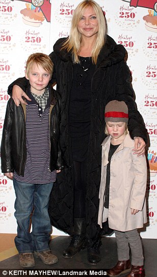 Family: Samantha with husband Mark Womack in 2007, and with their two children Benjamin and Lily-Rose