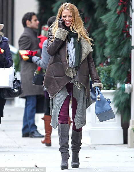 Hard at work: Blake films a scene for Gossip Girl outside of the Ralph Lauren store in the Upper East Side in New York