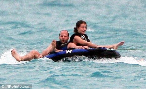 Thrill seekers: Rosie and Jason took to the sea and were pulled around by a powerboat as they sat on an inflatable