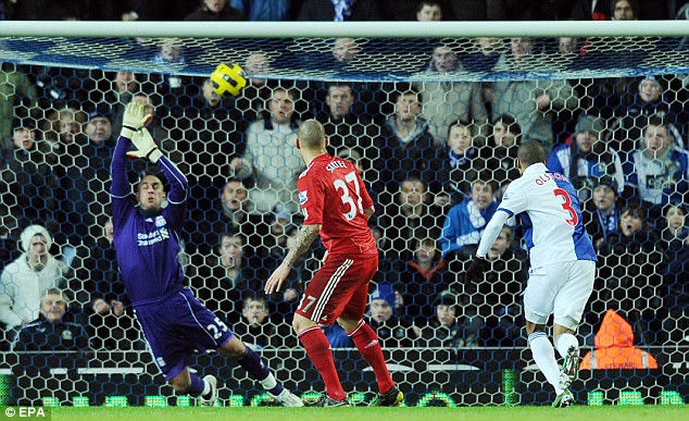 Another setback: Martin Olsson fires past Pepe Reina in Blackburn's win at Ewood Park