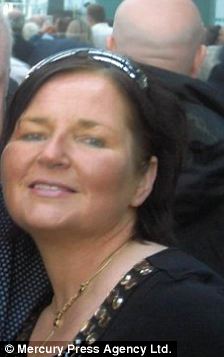 Julie Roberts, 45, from Liverpool pictured wih her partner Paul Hackett