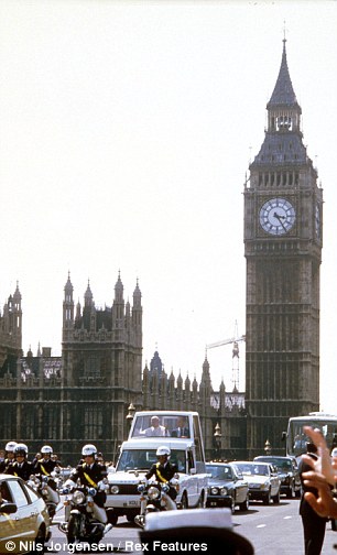 Police outriders escort Pope John Paul II across Westminster bridge on his  visit to the UK in 1982