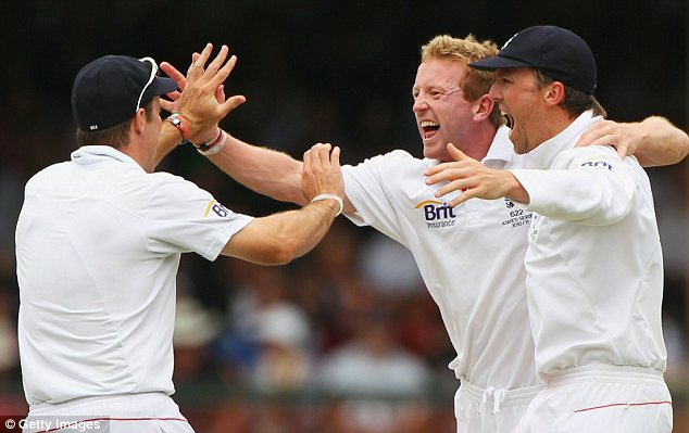 Team mates: Andrew Strauss, Paul Collingwood and Graeme Swann celebrate the dismissal of Michael Hussey