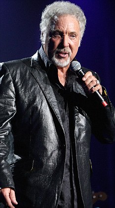 The show must go on: Gone is the  black hair but Tom Jones is still performing although he doesn't have to worry about Elvis sneaking on to join him on stage these days