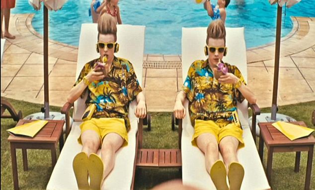 Jedward happily sip cocktails by the pool in the tongue-in-cheek TV commercial