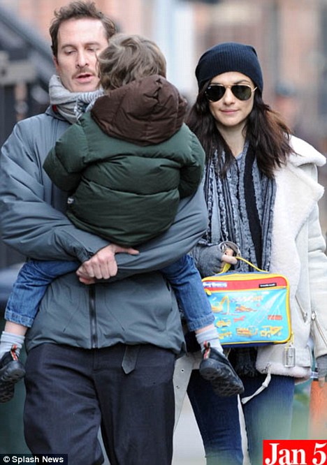 Back to school: Miss Weisz with her ex-partner Darren Aronofsky and their son Henry