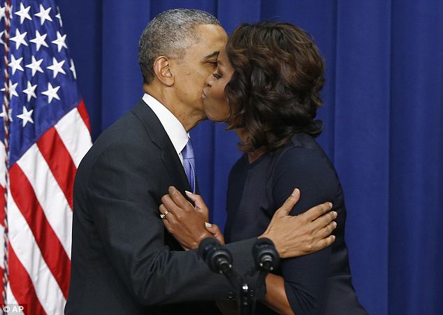 Sweet moment: The President greeted Mrs Obama during an event about the importance of college