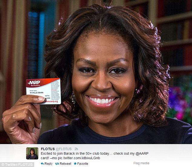 New perks: The First Lady showed that she was happy to get her membership card for the AARP, a seniors advocacy group that includes all Americans over 50