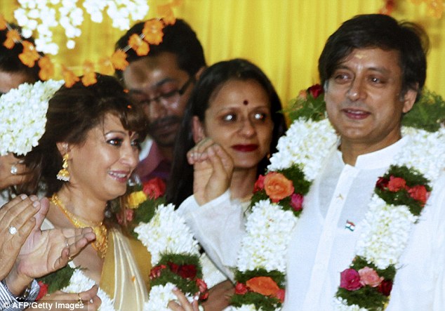 Couple: Shashi Tharoor and his bride Sunanda Pushkar pictured at their wedding, the third for each of them