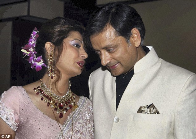 Shashi Tharoor and Sunanda Pushkar Tharoor are seen at their wedding in 2010. Since her death her son has said she died from 'stress' and 'wrong medication'