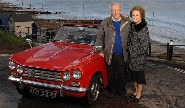 Covered: John and Bridget Snook with the Triumph he has owned for 35 years